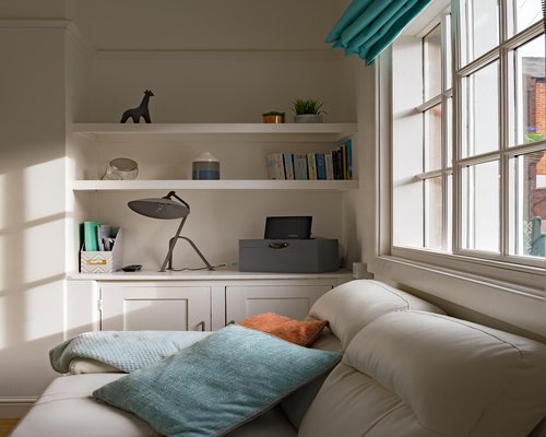 Italian apartment interior with soft daylight filtering through curtains